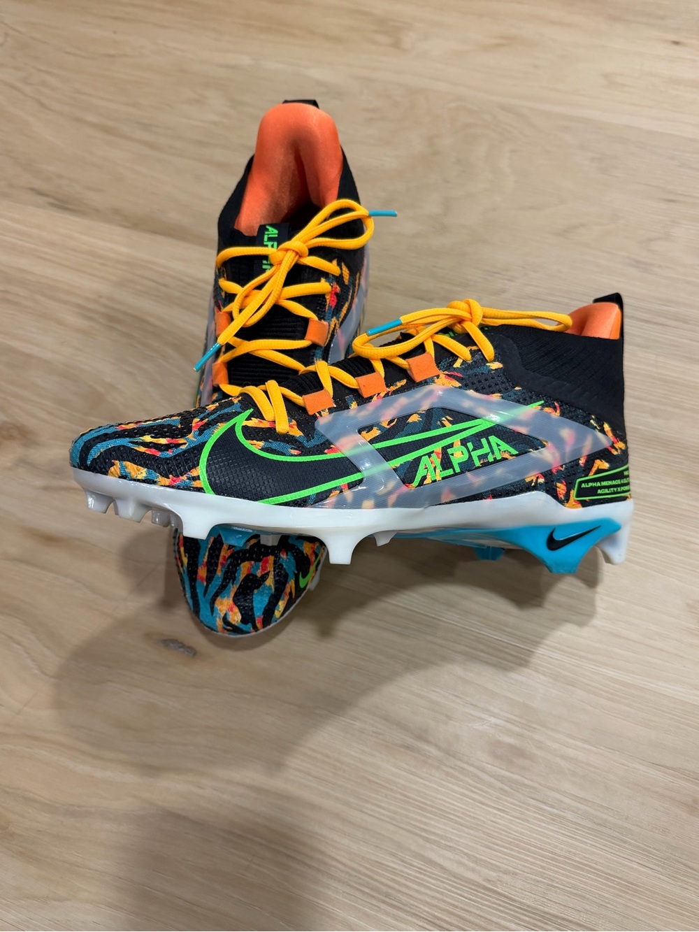 Nike Alpha Menace 4 Elite Cleat Travis Kelce Black, Orange, Yellow, Green, Blue